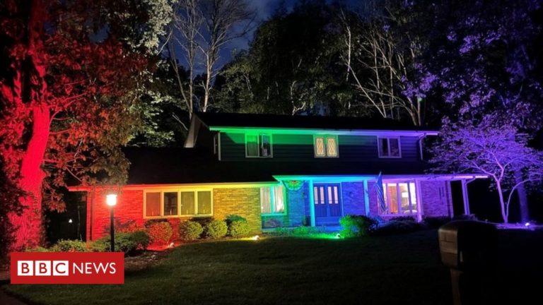 Gay couple in Wisconsin bypass flag rules with rainbow floodlights – BBC News